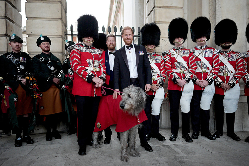 Britain's Prince Harry, Duke of Sussex poses with members of the Band of the Irish Guards and their mascot, Irish wolfhound dog 'Seamus', as he attends the inaugural Invictus Spirit Awards at the Old Royal Naval College in Greenwich, south-east London on September 17, 2026. (Photo by Aaron Chown / POOL / AFP)