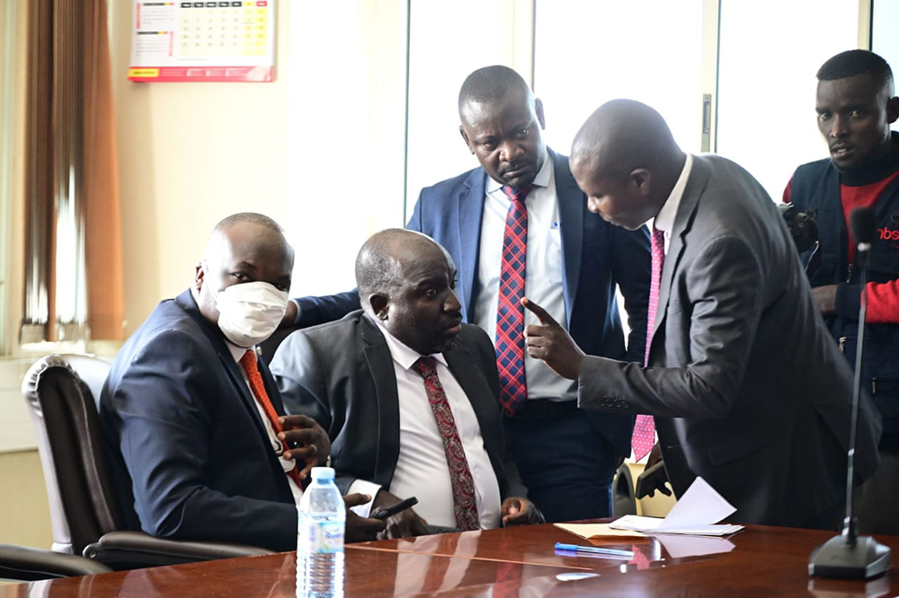 IGG officer (right) interacts Rajab Kaaya, Okema Leonard and Adilo Daniel at the IGG office. (Courtesy: IGG)