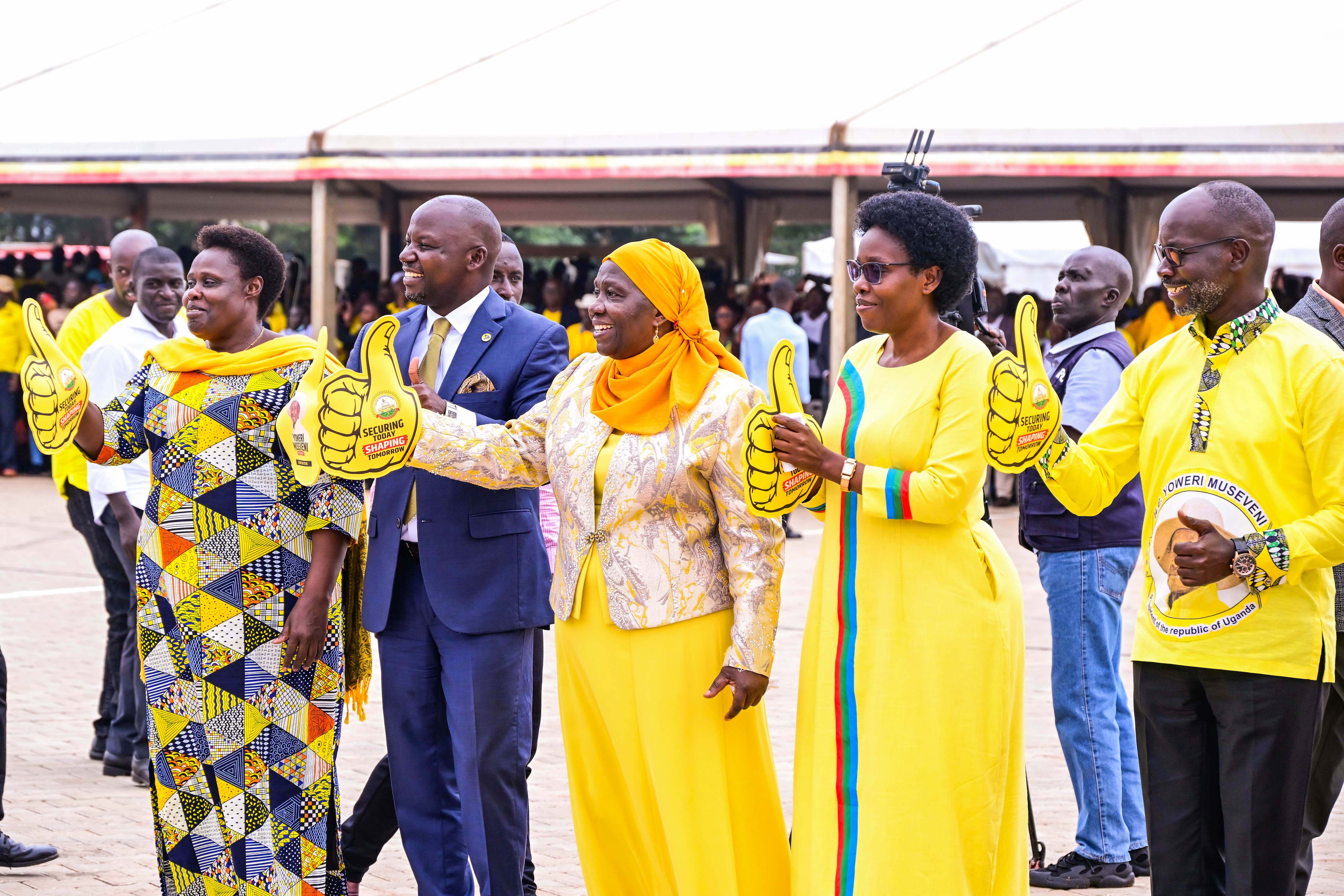 From (L-R) VP Alupo, Hon Kiwanda, Hon Minsa Kabanda, Hon Nabakooba and Hon Obua welcoming President Museveni at Kololo on Sunday.