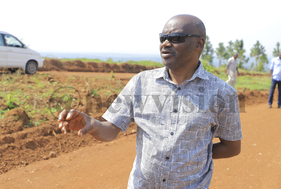 Julius Kavuma Kabenge explains to Vision Group staff this motorsport facility concept