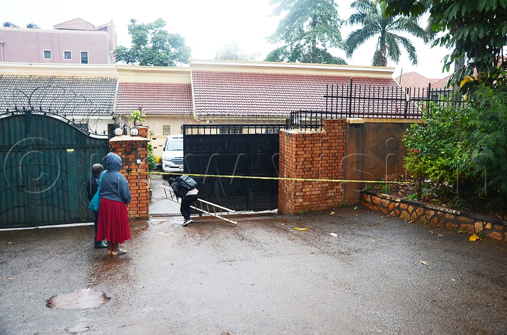 The crime scene which was cordoned off by the police along Ntinda Martyrs Day Road with a yellow ribbon shocked residents in Ntinda (Photo by Isaac Nuwagaba)