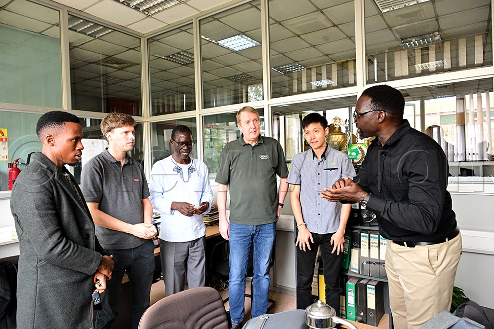 Sidney Miria (Right), the Content Manager Special Projects speaking to the investors. (Credit: Eddie Ssejjoba)