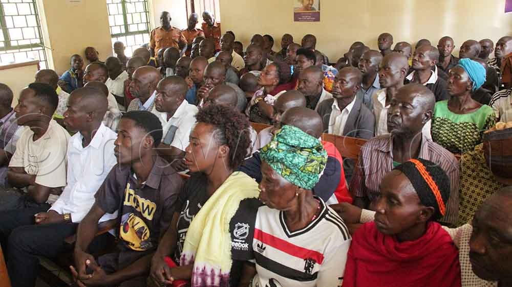 Residents during a court session. (Credit: Samuel Amanyire)