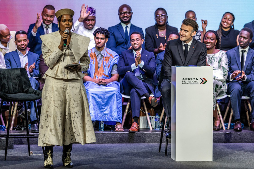 France’s President Emmanuel Macron (R) listens to young leaders as he takes part in the youth session Africa Forward: Future Makers during the Africa Forward summit in Nairobi on May 11, 2026. (AFP)