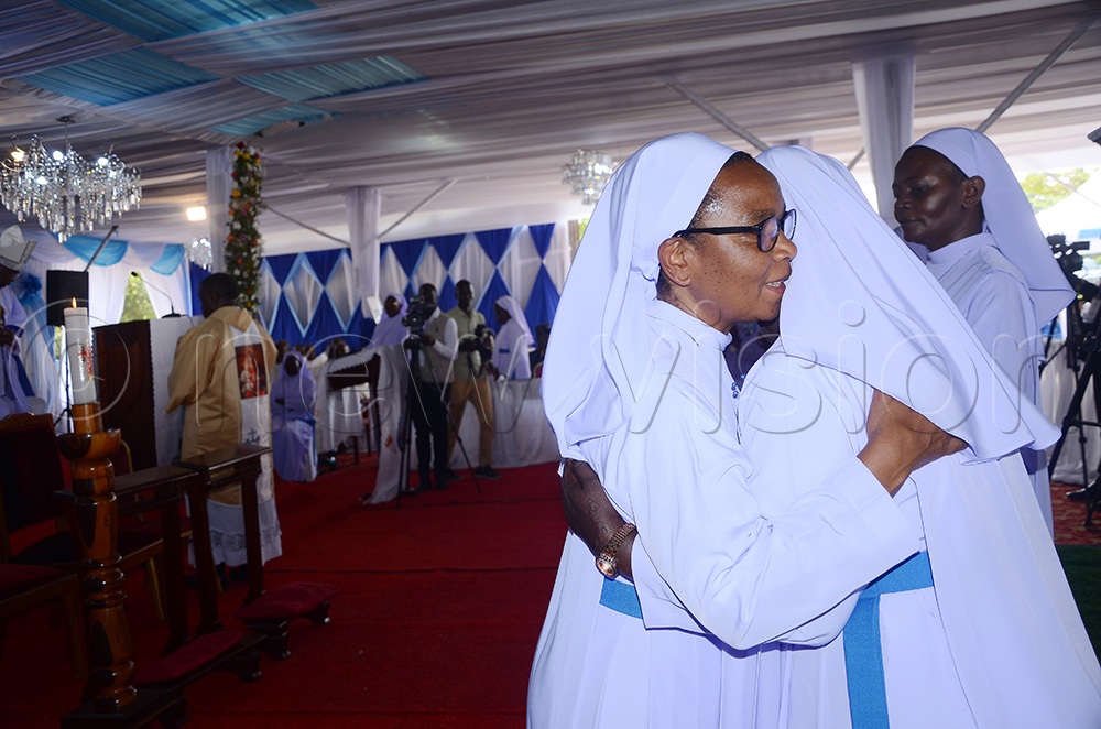The Mother General, Sister Dr. Mary Speranza Namusisi congratulates sisters after making vows on Sunday January 4, 2026. (Photo by Juliet Anna Lukwago)