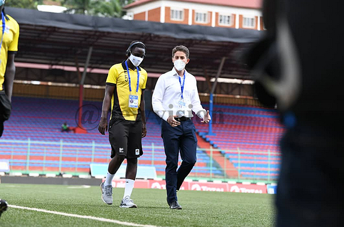 Cranes coach in a conversation with one of his players