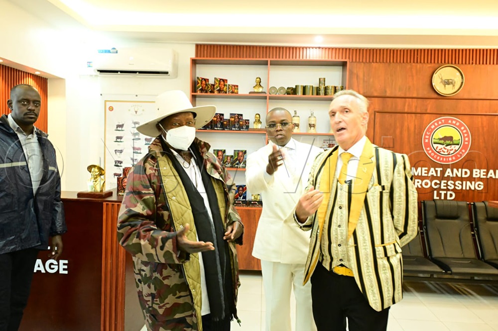 President Museveni interacts during a tour of the factory. (Credit: Eddie Ssejjoba)