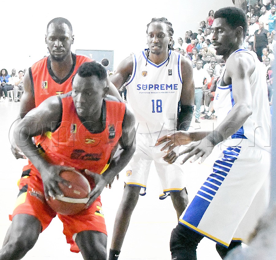 Nam Blazers' Peter Obleng (left) beats City Oilers Jonathan Komagum and Titus Lual  during Game-6 of the FUBA finals at Lugogo, August 19, 2026. Nam Blazers won 82-64. Photo by Michael Nsubuga