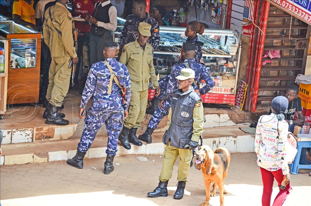 Police with a sniffer dog during a joint security operation at Kalungi Plaza down town Kampala as they searched for laptops and other items stolen from the Bank of Uganda (BOU) building on Plot 45, Kampala Road. This was on Monday, May 4, 2026. 