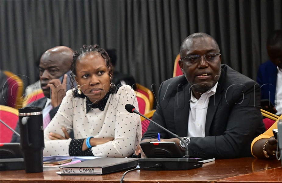 Ndorwa East MP Wilfred Niwagaba and Anne Adeke Ebaju Soroti District Woman MP during the joint Parliament's joint Defence and Legal Committees, April 28, 2026. (All Photos by Maria Wamala)