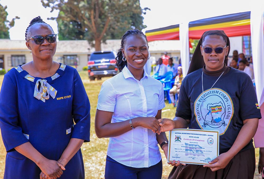 Lukisa (C) challenged the graduates to demonstrate their love for Uganda by providing quality health services to all Ugandans, including those living in the most remote communities, regardless of whether they receive allowances.