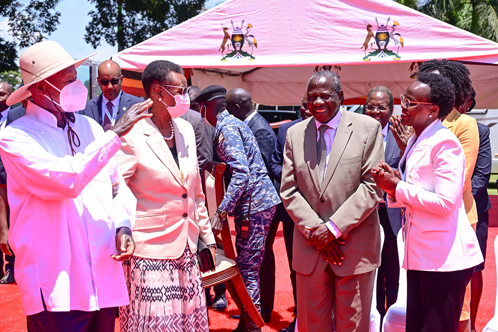 President Museveni and First Lady Janet chat with Finance Minister Matia Kasaija and UDB Managing Director Patricia Ojangole (R) during the opening ceremony of Uganda Development Finance Summit at Speke Resort Munyonyo. (PPU Photo)