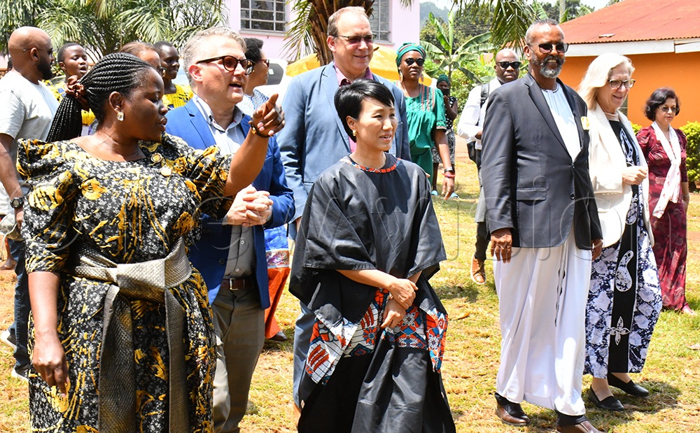  Busoga Kingdom's Kyabazinga Affairs Minister Owek. Yudaya Babirye (left) leading Won Young Hong (3rd left) UNFPA’s Deputy Regional Director for East and Southern Africa, Markus Larsson (2nd Left) the Programme Specialist SRHR, Busoga Kingdom's Second deputy Prime Minister Alhaji Osman Noor Ahmed (3rd right) in touring the Kingdom headquarters at Bugembe in Jinja City on September 10th, 2025.  (Credit: Donald Kiirya)