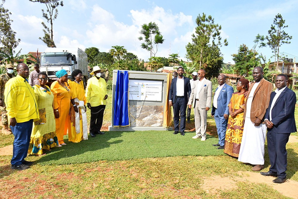 (L-R) Agricultural State Minister Fred Kyakulaga, Minister of General Duties in the OPM Justine Lumumba Kasule, Third Deputy Prime Minister Rukia Nakadama, First Deputy Prime Minister Rebecca Alitwala Kadaga, President Yoweri Museveni, Kyabazinga of Busoga William Gabula Nadiope IV, Busoga Kingdom's 2nd deputy Prime Minister Alhaji Osman Ahmed Noor, Prof. Muhamadi Lubega Kisambira, Kyabazinga Affairs Minister Yudaya Babirye, Busoga Kingdom's Culture Minister Richard Mafumo and Busoga Kingdom's Minister of Finance Ivan Kiirya, in a group photograph after the ground breaking ceremony for construct of ObwaKyabazinga Bwa Busoga headquarters at the Kingdom headquarters in Jinja City on Friday. (Credit: Donald Kiirya)