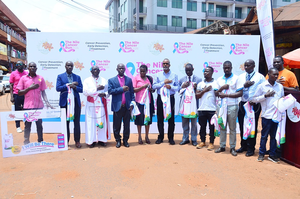 The deputy prime minister of Busoga Kingdom, Owek Al Osman Noor Ahmed, poses for a group photo with religious leaders and officials from Rays of Hope Hospice Jinja and Uganda Cancer Institute. (Photo by Agnes Kyotalengerire)