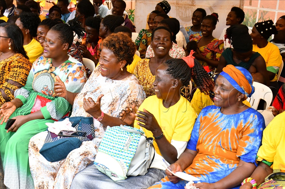 Women in a happy mood during their meeting with Dorothy Kisaka (not in picture) at Buweera village in Jinja district on Monday.