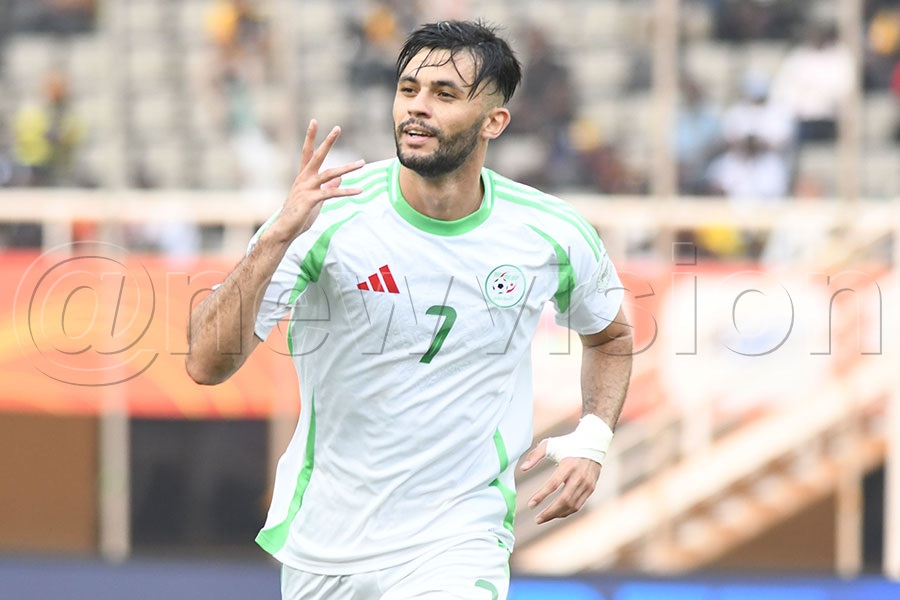 Algeria's Abdennour Iheb Belhocini celebrates his goal against South Africa during a CHAN Group C match at Namboole.Photo by Michael Nsubuga