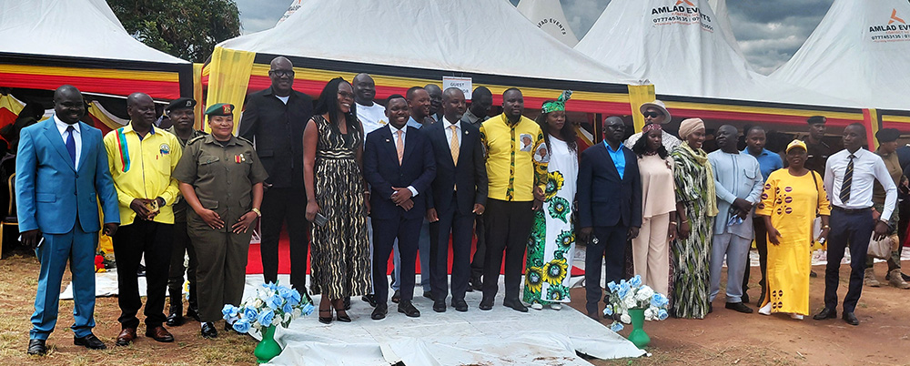 Deputy speaker Thomas Tayebwa and Lawrence Alionzi, joined by other leaders pose for a photo at his thanksgiving ceremony in Arua City. (Photo by Robert Adiga)