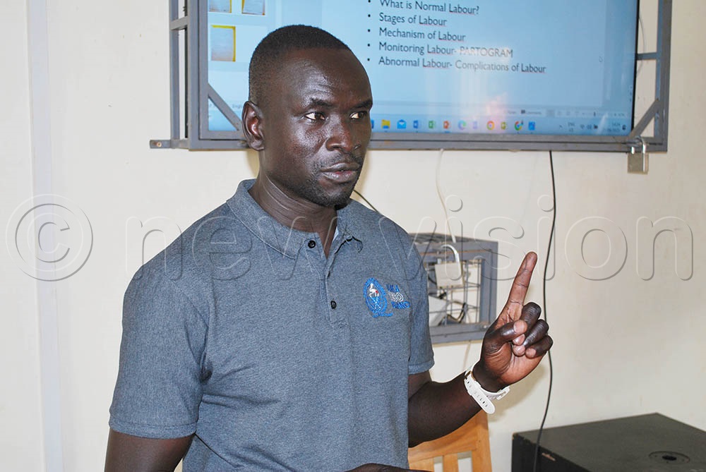 Dr Stephen Ayella addressing health workers of Amuria after he ordered for the arrest of two medical workers. (Credit: Godfrey Ojore)