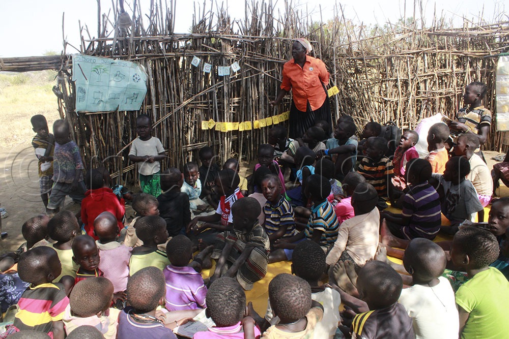 Korobe conducting a lesson at Lokodiokodio 4 Community School in Napak district.