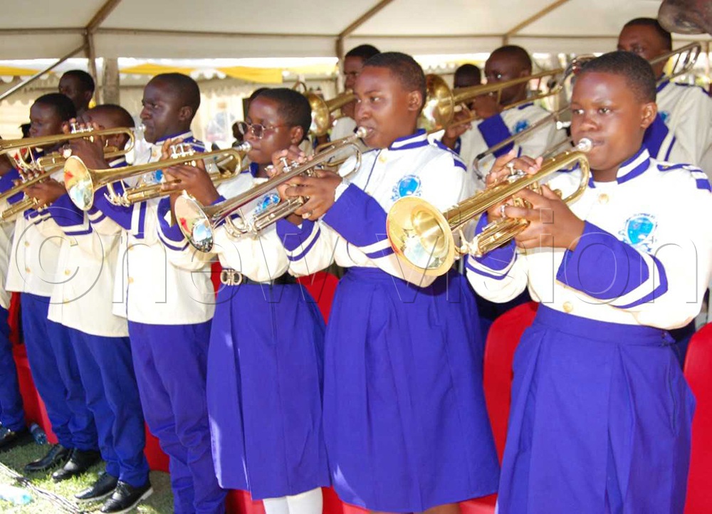 The brass music ensemble from St. Cyprian High School Kyabakadde in action during the function. (Credit: Mathias Mazinga)