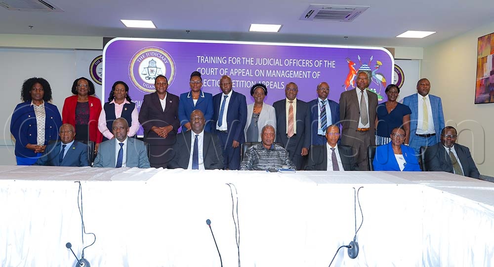 Deputy Chief Justice Moses Kazibwe Kawumi with justices of the Court of Appeal and guest speakers at the closing of the training on management of election appeals on Friday June 5, 2026. (Credit: Farooq Kasule)