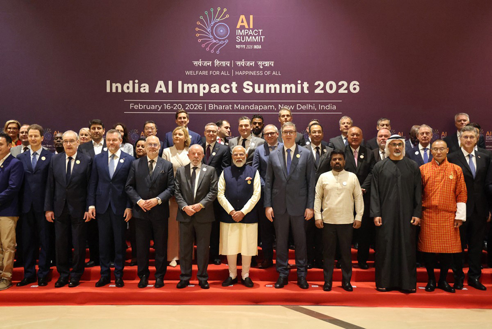India's Prime Minister Narendra Modi (C) and Brazil's President Luiz Inacio Lula da Silva (centre L) pose with other world leaders and representatives for a group photo during the AI Impact Summit in New Delhi on February 19, 2026.