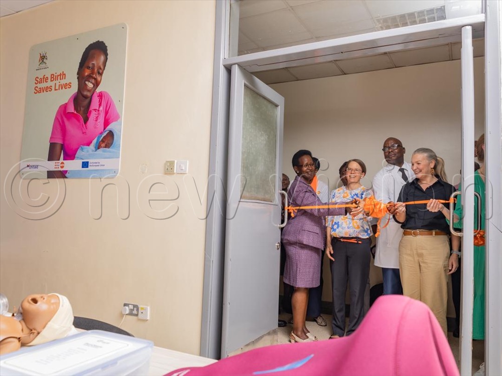 Permanent Secretary Dr Diana Atwine, UNFPA Representative Kristine Blokhus, EU Head of Cooperation Karolina Hedstrom and Dr Byaruhanga Emmanuel Kayonza cut a ribbon to officially open the new hub.
