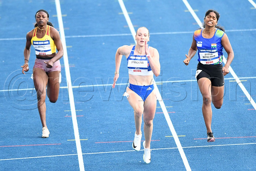 Mercy Charity Atiang (left), Slovakia\s Viktória STRÝCKOVÁ and India's Angelsilvia MARIYA MUTHU RAJA in action during the 100m competition of the FISU World University Games at the Lohrheidestadion ib Bochum. Photo by Michael Nsubuga