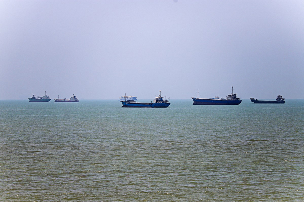 In this picture obtained from Iran's ISNA news agency on June 18, 2026, vessels are seen anchored in Bandar Abbas along the Strait of Hormuz.