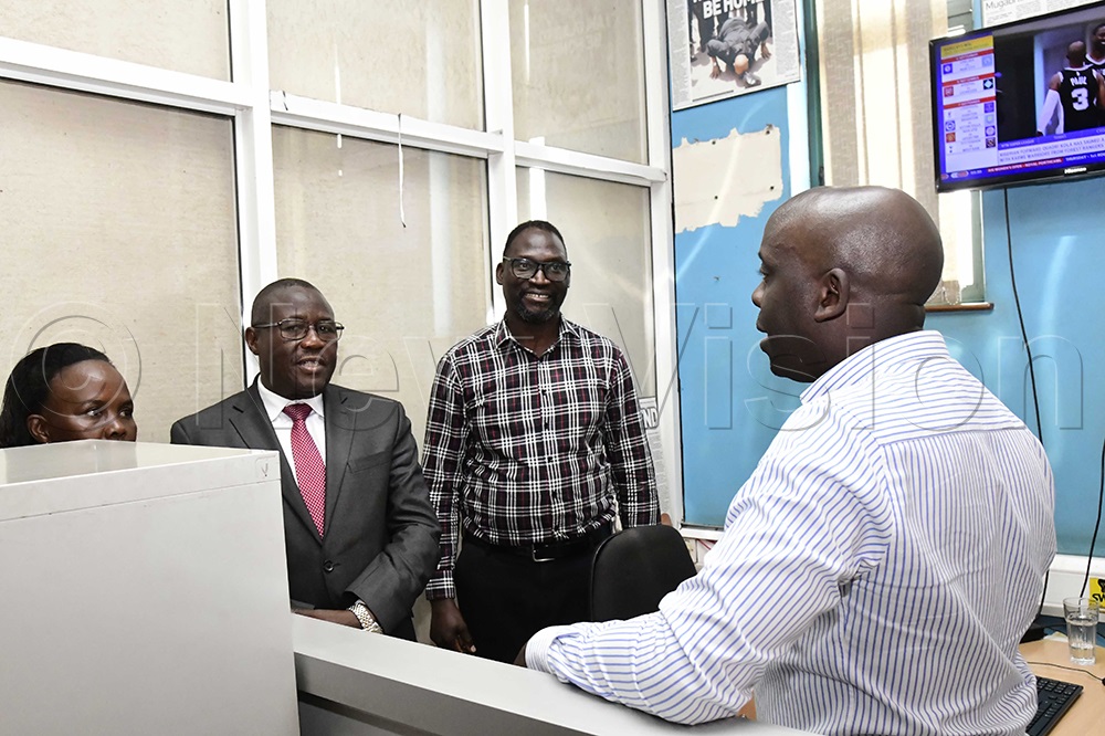 The Wakiso LC5 chairman, Matia Lwanga Bwanika (second left) speaking to Fred kaweesi, the sports editor at the New Vision head office in Kampala, July 29,2025. (Photo by Eddie Ssejjoba)