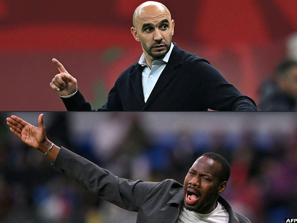 Morocco's head coach Walid Regragui and his opposite Pape Thiaw of Senegal