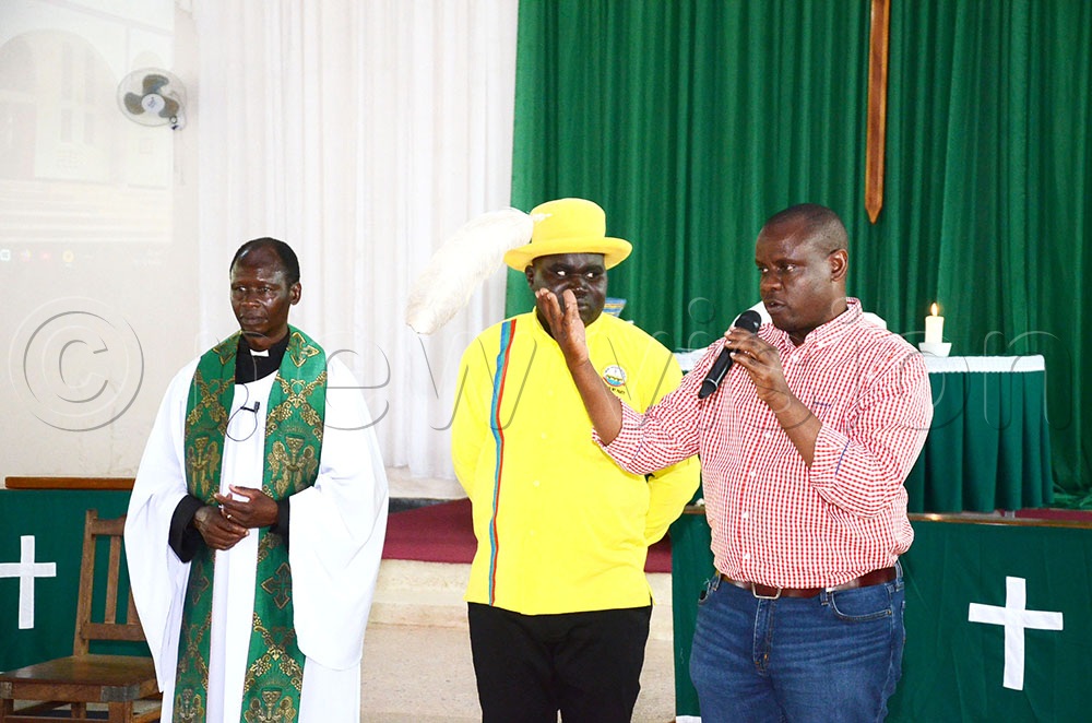 Balaam Barugahara (extreme R), the minister of state for youth and children affairs addressing as Rev. Joseph Ichumar (extreme L) and Peter Komol Lotee the Kotido district Chairperson look on. This was during a church service at St. Philips Cathedral Church of Uganda in Moroto city on October 26, 2025. (Credit: Lawrence Mulondo)