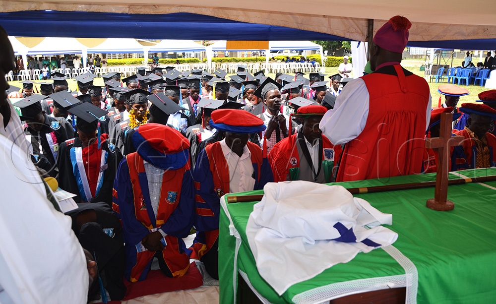 Bishop of the Church of Uganda Diocese of Soroti, Rt Rev. Kosea Odongo, blessing the graduates of Ogolai Vocational Training Institute in Amuria district on Friday, July 17, 2026. (Credit: Delux Emmy Alomu)