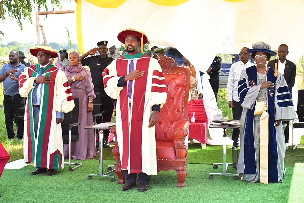 From L-R: Prof. Dr. Muhamadi Lubega Kisambira, the Executive Director of Lubega Institute of Nursing and Health Professionals, Kyabazinga of Busoga William Gabula Nadiope IV and Rebecca Alitwala Kadaga, the First Deputy Prime Minister and Minister of East African Community Affairs at the 6th graduation ceremony in Busei village in Iganga district on May 30th. (Photo by Donald Kiirya)