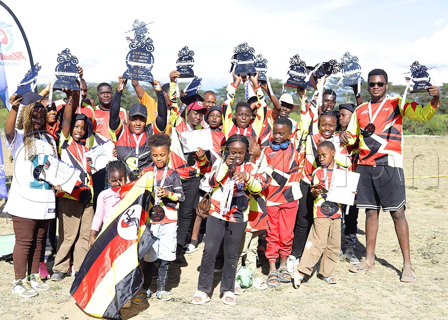 The Ugandan Riders shows off the trophies won at the FIM CAC in Naivasha Kenya