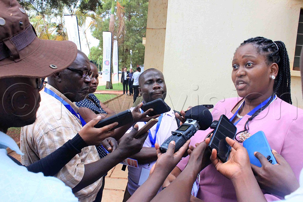 Chissono Semani (right), from the University of Livingstone, Malawi, a journalist under COMMPASS training addressing journalists at the closure of the conference at UCU on Thursday. (Photo by Henry Nsubuga)