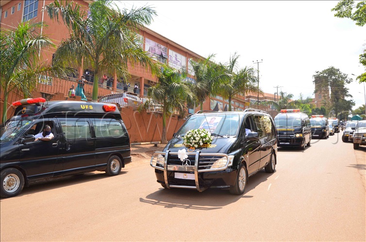 A spectacle of the convoy of funeral vans that accompanied Regina Mukiibi's casket from Rubaga Cathedral to Kitemu