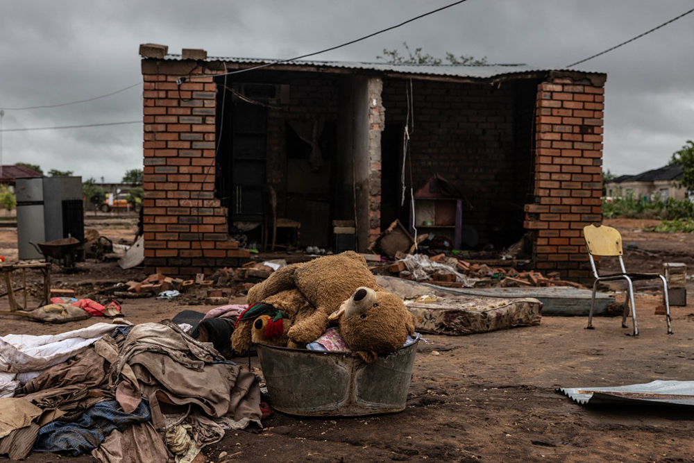 A general view of a teddie bear in a tub in front of a demaged house following floods in Mbaula village, 50 km from Giyani on January 17, 2026 following heavy rains over much of the Limpopo Province, South Africa. 