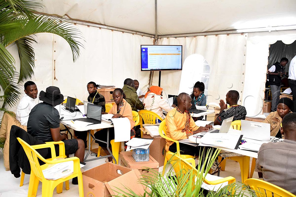 NRM support staff digitialising the party register at the NRM offices in Nakasero. (Photo by Simon Peter Tumwine)