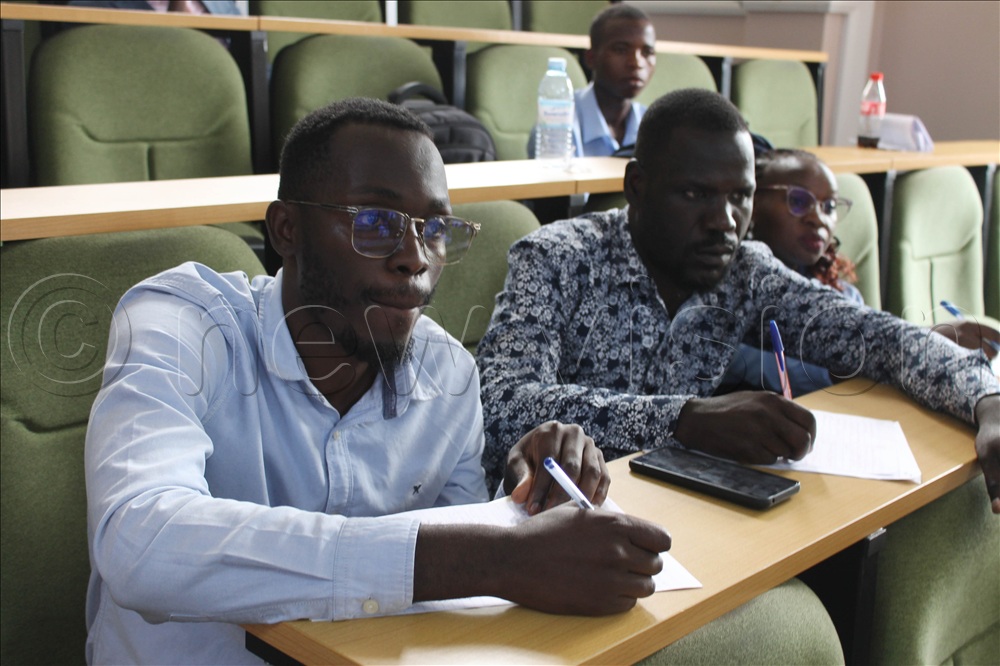 Judges taking notices at the Western Region International University Debate Competition