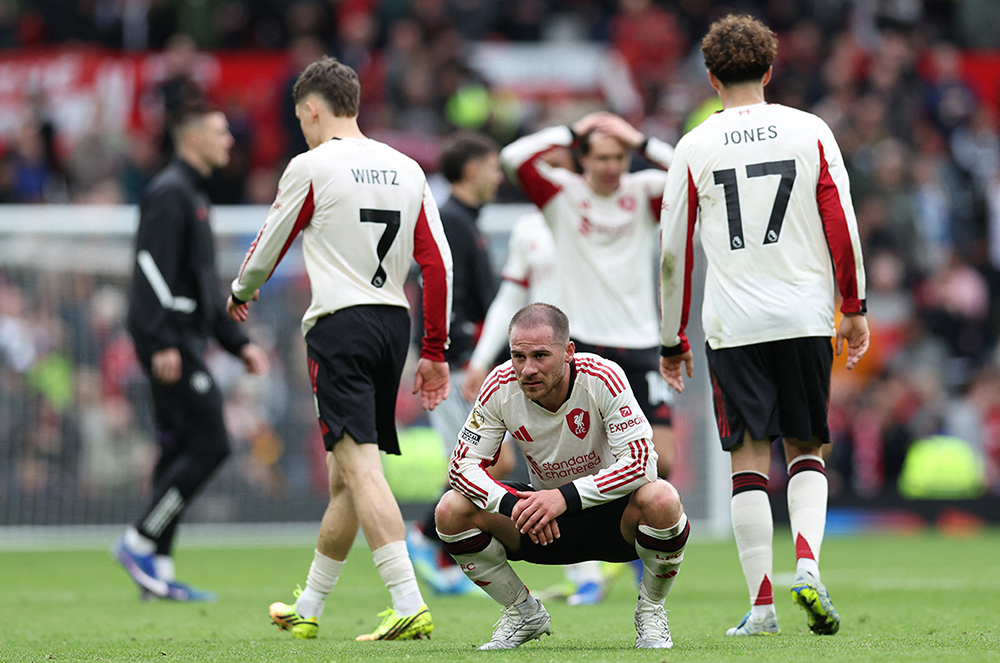 Liverpool's Argentinian midfielder #10 Alexis Mac Allister reacts after the English Premier League football match between Manchester United and Liverpool at Old Trafford in Manchester, north west England, on May 3, 2026. 