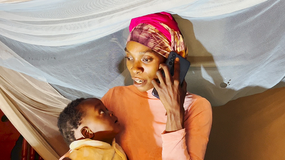 Nankya Prossy prepares to take her feverish baby to the hospital. (Courtesy)