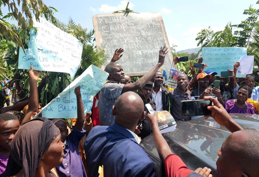 The residents told the Minister that six years after being displaced, they have never been permanently resettled by the Office of the Prime Minister. (Credit: Lawrence Mulondo)