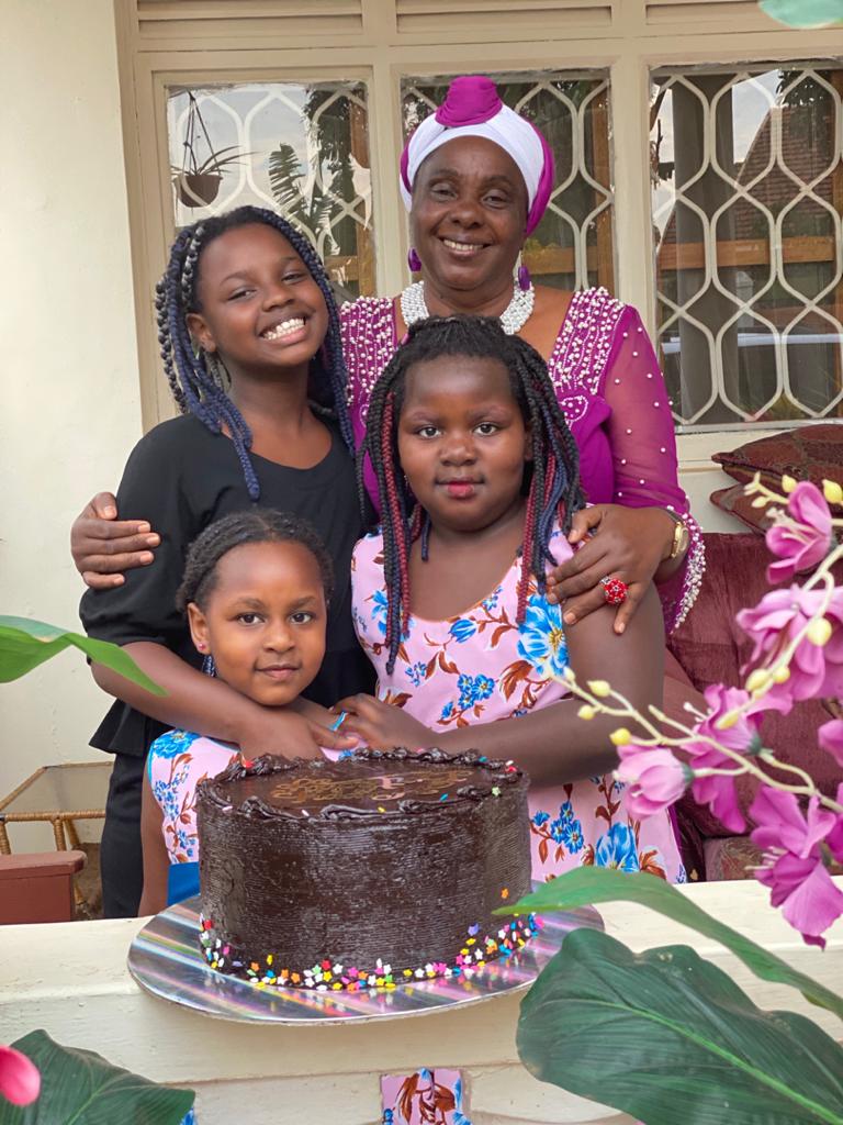 Hon Mary Karooro Okurut celebrating her birthday with her grandchildren.