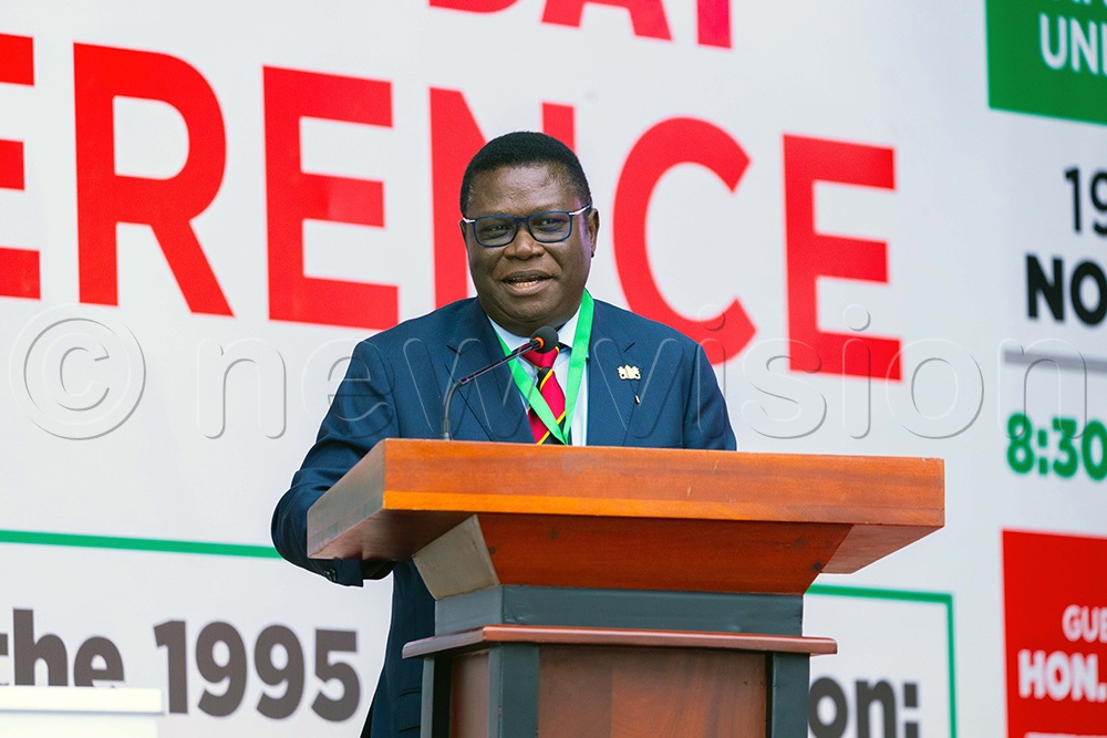 Justice and constitutional affairs minister Norbert Mao addressing guests, participants and officials from Makerere University during the World Philosophy Day celebrations held at Makerere University Main Hall. (Photo by John Odyek)