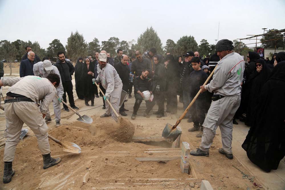 People visit Behesht-e Zahra cemetery to honor their deceased relatives on the last day of Eid al-Fitr in Tehran, Iran on March 22, 2026. Residents of Tehran flocked to Behesht-e Zahra cemetery, where both civilians and soldiers killed in the clashes are buried, due to Nowruz and Eid al-Fitr. (Credit: AFP)