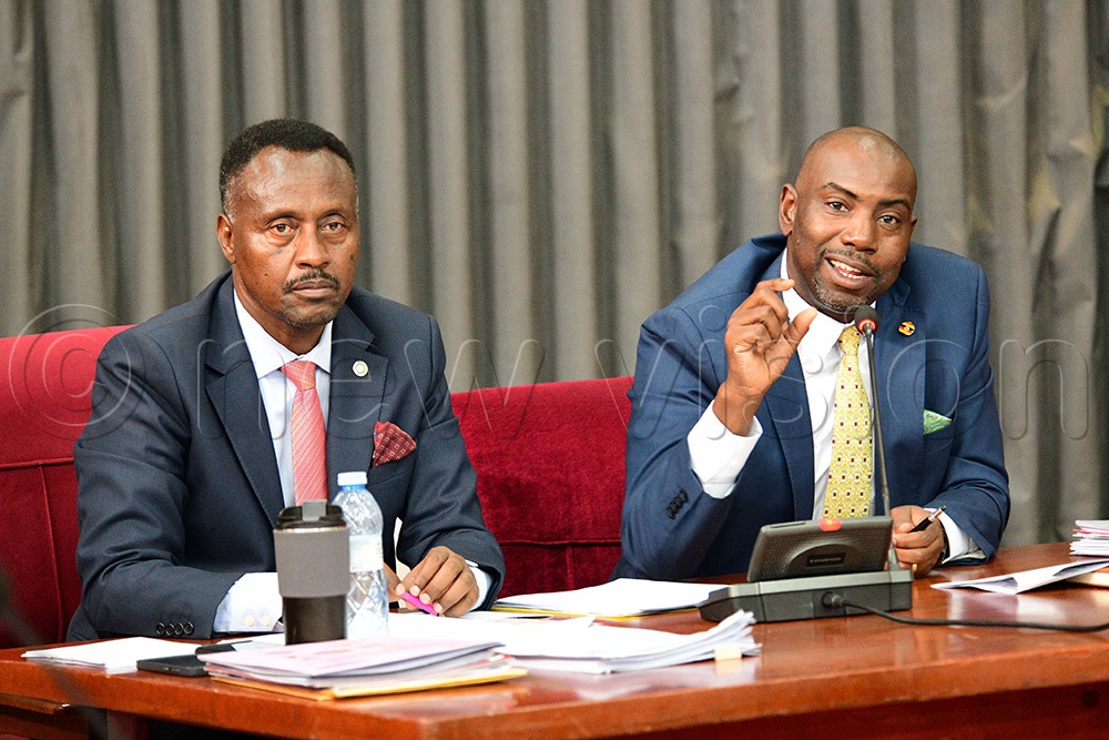 Amos Kankunda Finance committee Chairperson and MP Rwampara County, and Dickson Kateshumbwa, the Member of Parliament for Sheema municipality during the finance committee of parliament on April 15, 2026. (Photo by Maria Wamala)