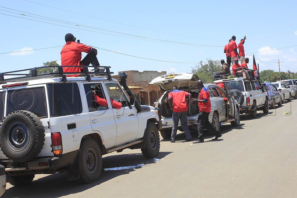 A long queue of vechicles carrying mourners for former Milton Obote's memorial service on Friday. (Photo by Solomon Okabo)