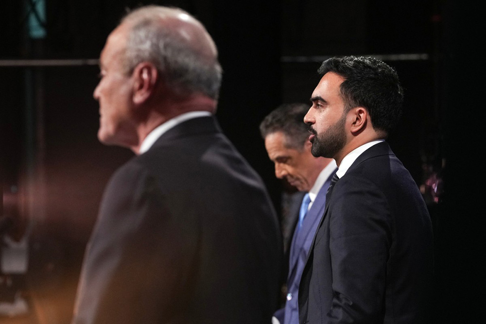 Democratic candidate Zohran Mamdani (R) Republican candidate Curtis Sliwa (L) and Independent candidate and former New York Governor Andrew Cuomo participate in the second New York City mayoral debate at LaGuardia Performing Arts Center at LaGuardia Community College in Long Island City, Queens, New York, on October 22, 2025. (Photo by Hiroko MASUIKE / AFP)